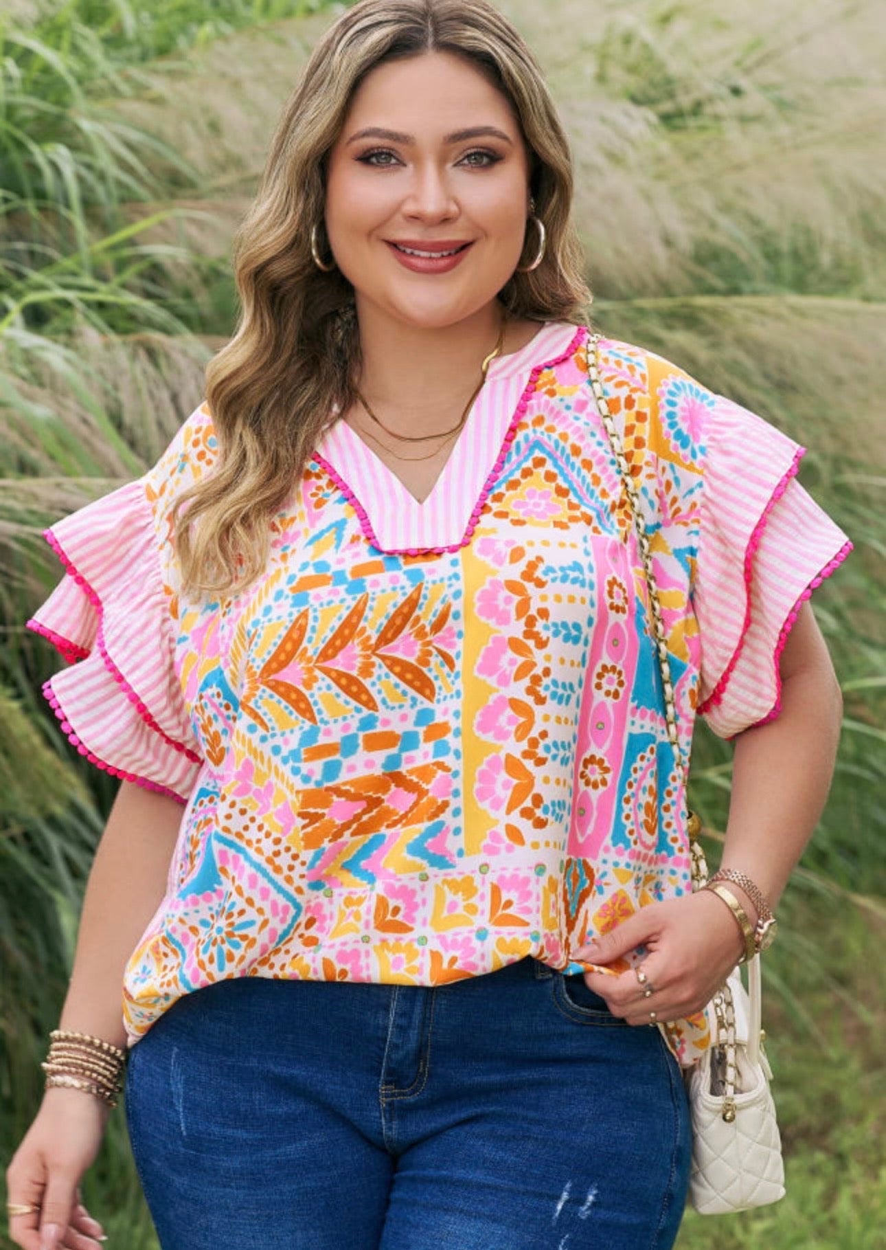 Floral flutter curvy top